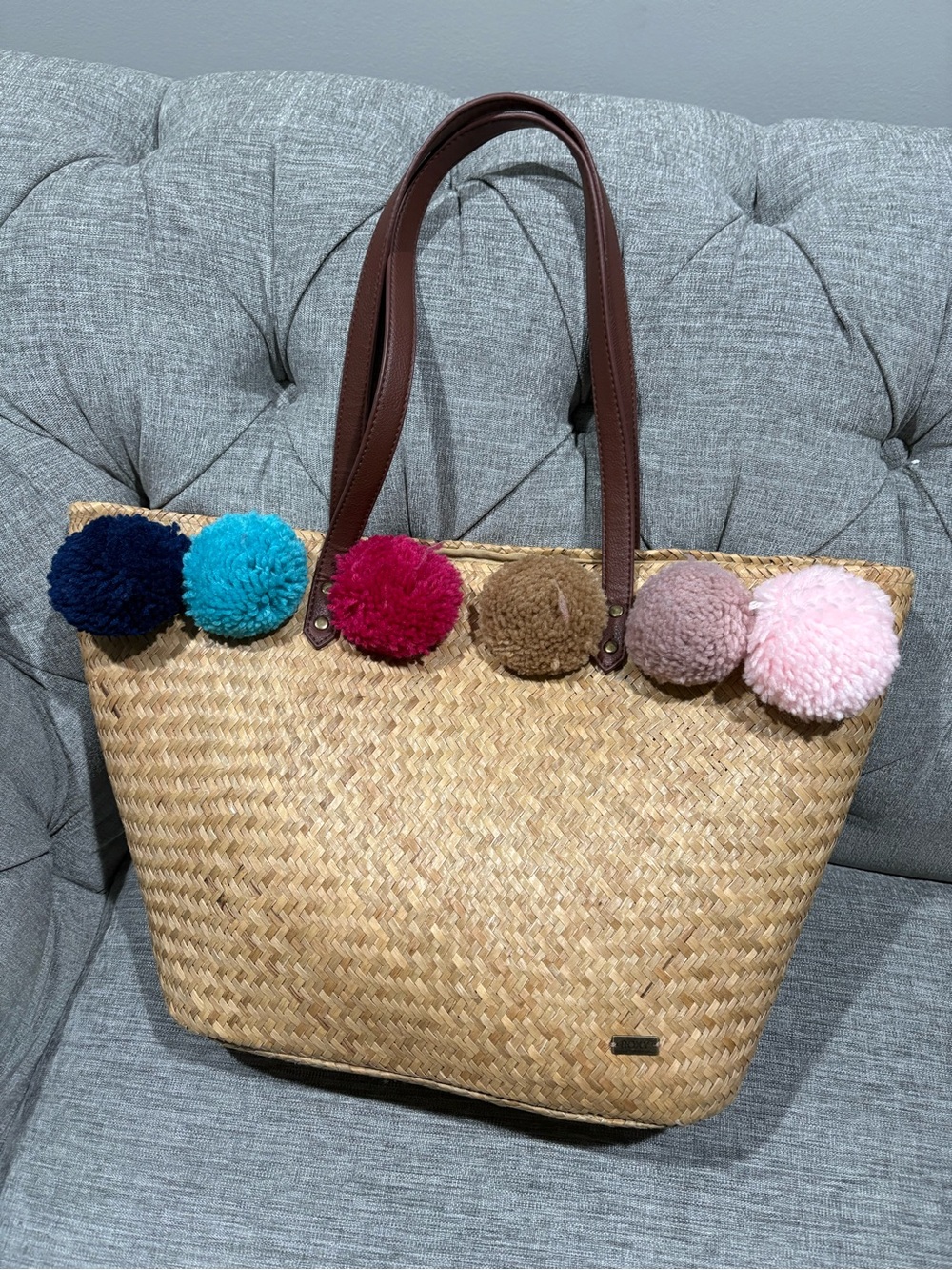 Roxy Straw Tote with Multicolor Pom-Poms and Brown Handles